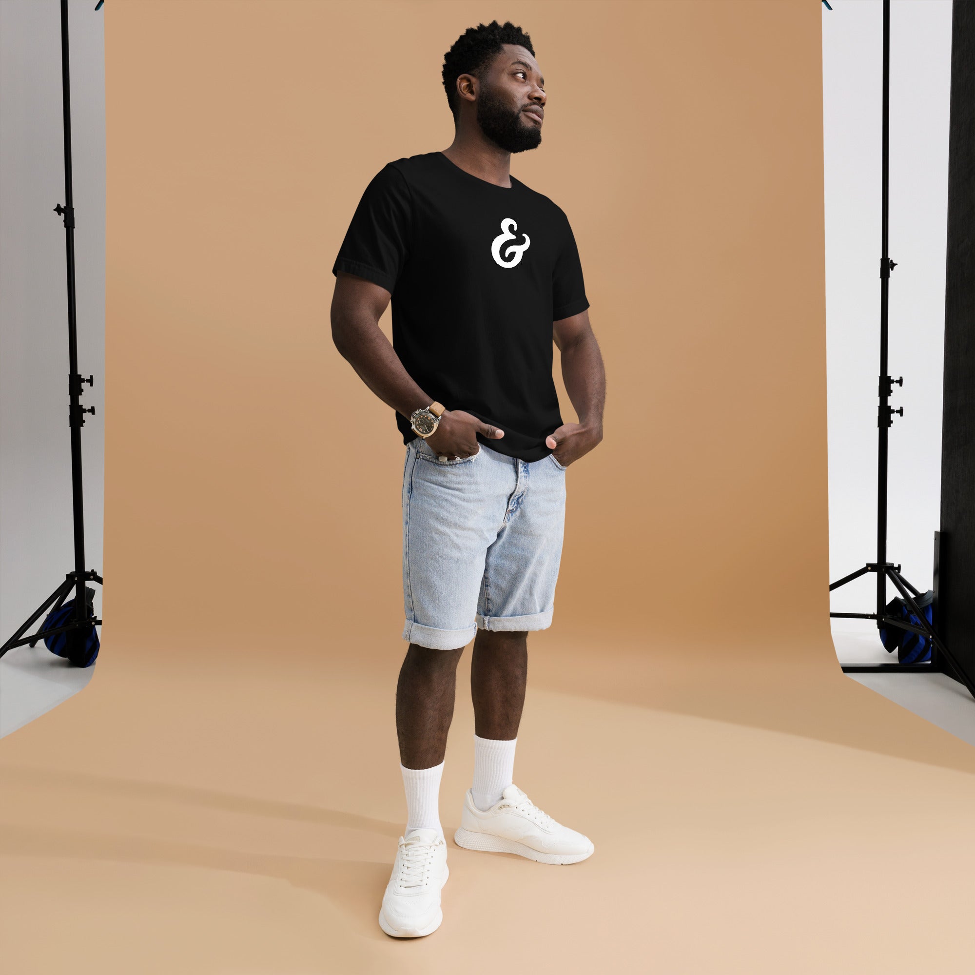 Black T-shirt with a white ampersand on the front with the model in full view