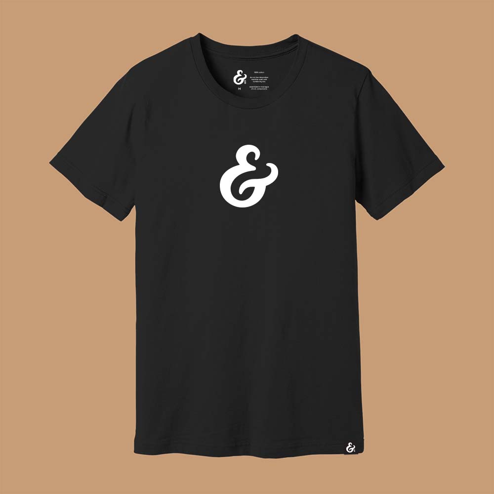 Black T-shirt with a white ampersand on the front